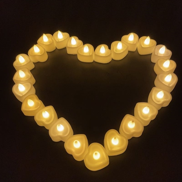 Hjerteformet fyrfadslys i hvide farver - Varmt hvidt lys - 24 stk