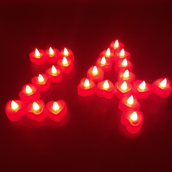 Hjerteformet fyrfadslys i røde farver - Varmt hvidt lys - 24 stk