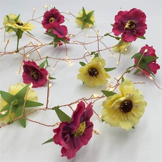 Istap lyskæde med røde og gule blomster