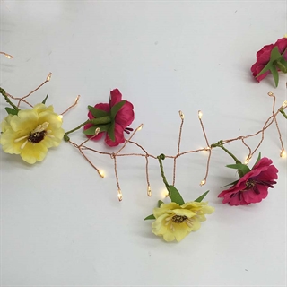 Istap lyskæde med røde og gule blomster