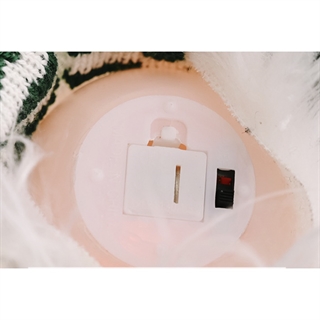 Julenisser med lys i mave 