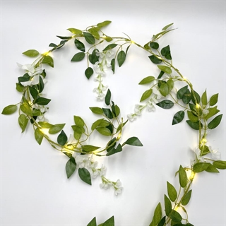 Lyskæde med blomster og blade