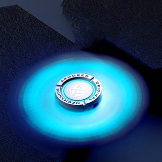 Lysende fidget spinner inklusiv UV-lampe