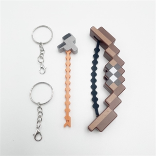 Mini pixel bue og pil legetøj med skydefunktion og nøglering