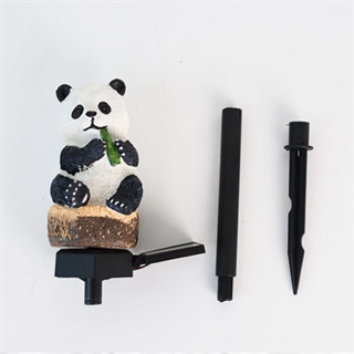 Panda solcelle havelampe oplades i sollys
