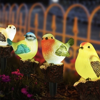 Solcellelampe med fugle på spyd