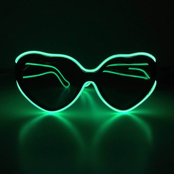 Hjerteformede briller med grønt lys